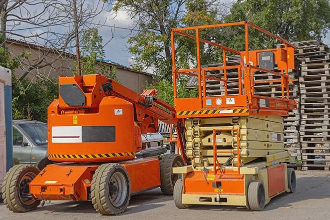 warehouse worker operating forklift to stack inventory in Gladys VA